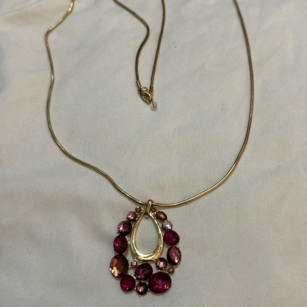 Gold tone purple gemstone pendant necklace